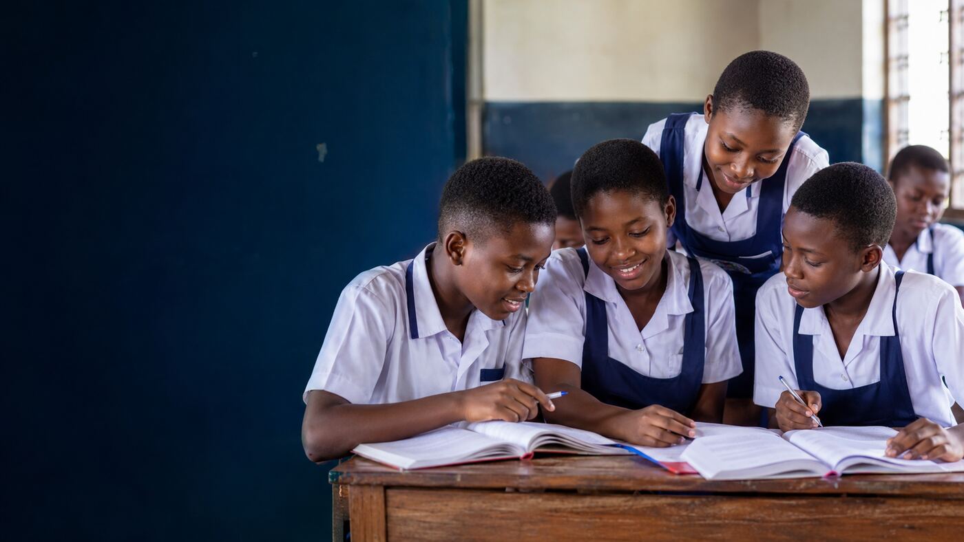 Ghanaian JHS students studying together
